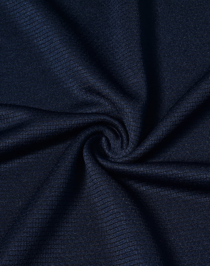 A close-up of navy fabric featuring a textured weave, suitable for lightweight performance t-shirts.