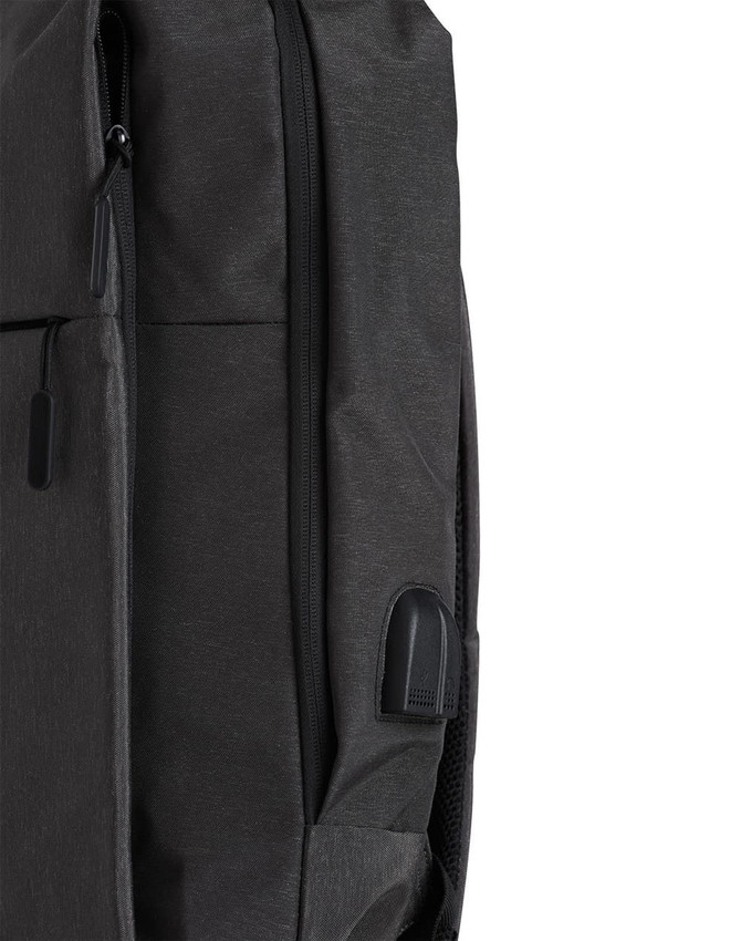 A grey backpack with a sleek design and zippers, featuring a small logo on the side.