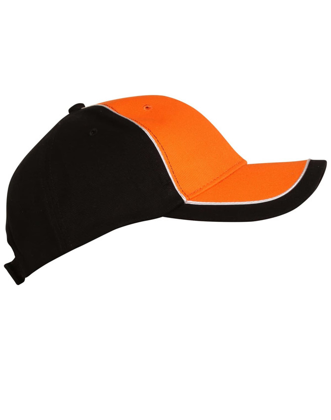 A cap featuring a tri-colour design of black, orange, and a contrasting trim, with a logo on the side.