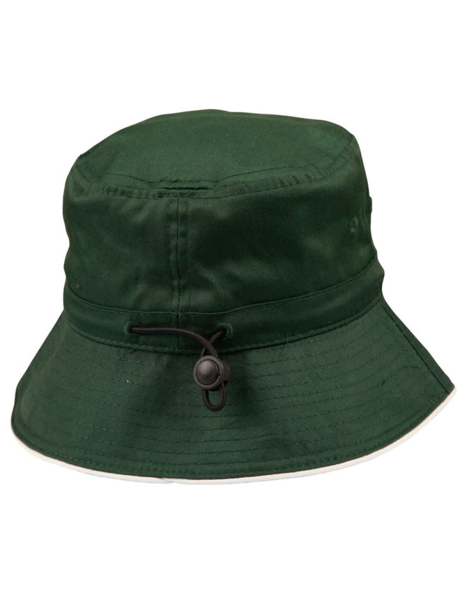 A green bucket hat with a toggle adjustment, featuring a wide brim and a structured design.
