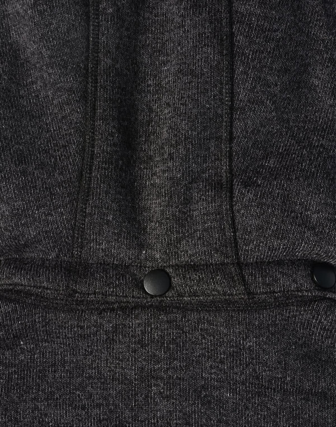 A black heather fleece jacket featuring a zip closure and two snap buttons at the hem. It has a logo present.