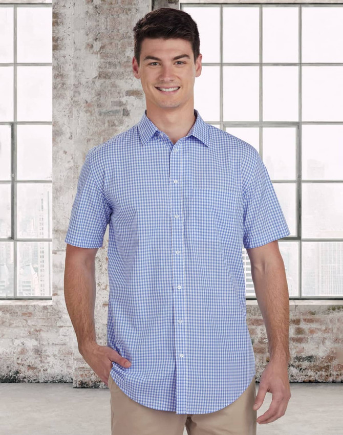 A short-sleeved men's button-up shirt in blue and white gingham check, featuring a logo on the chest.