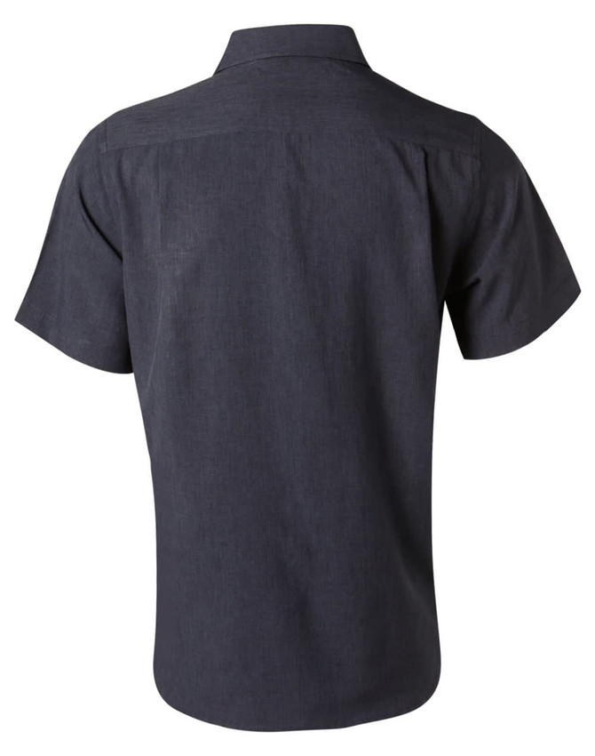 A dark grey short sleeve shirt with a back yoke and a logo. Designed for comfort and breathability.