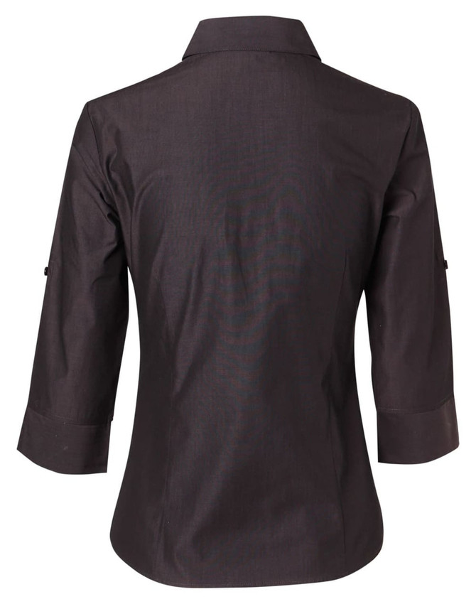 A women's 3/4 sleeve button-up shirt in dark colour, featuring a back view with rollable sleeves. Includes a logo.