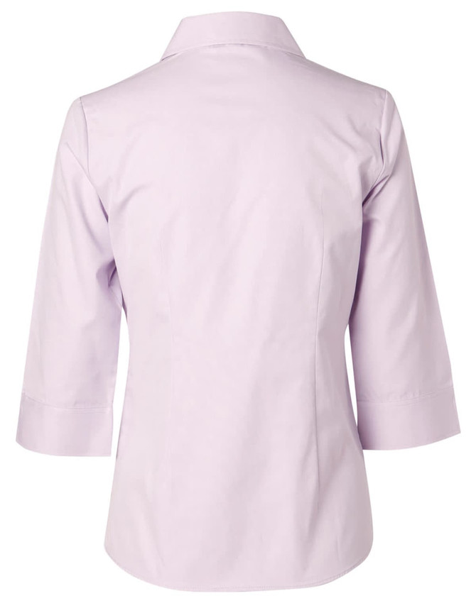 A pale lavender women's 3/4 sleeve button-up shirt, featuring a classic collar and a branded logo.