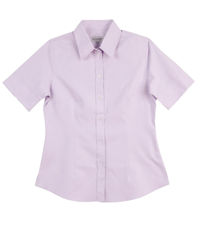 A light purple women's button-up shirt with short sleeves and a collar, featuring a logo.