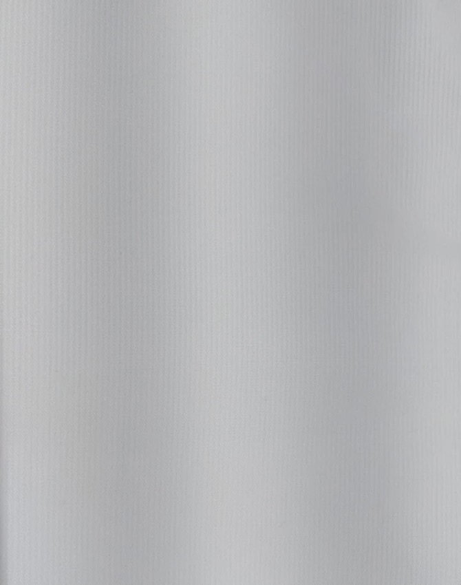 A light blue textured fabric for a ladies' button-up shirt with 3/4 sleeves and a logo.