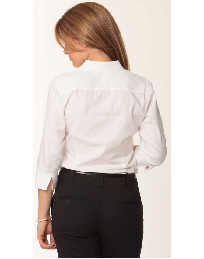 A white women's mini herringbone 3/4 sleeve button-up shirt with a back yoke detail. Features include a logo on the side.
