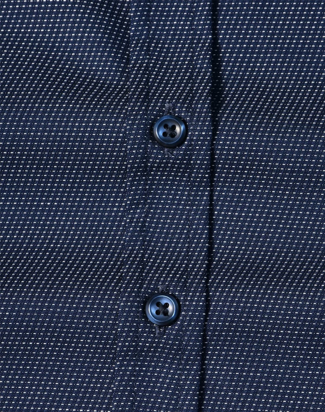 A navy blue button-up shirt with a pin dot pattern and blue buttons. Features a textured fabric design.