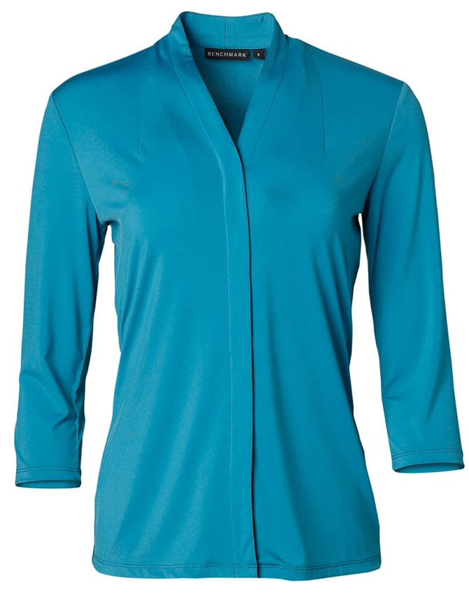 A turquoise mid sleeve knit top featuring a shawl collar and a branded tag.
