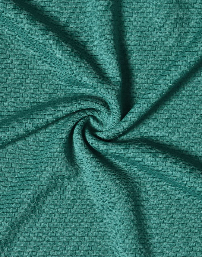 A textured fabric in a rich teal colour, showcasing a subtle pattern and a smooth finish.