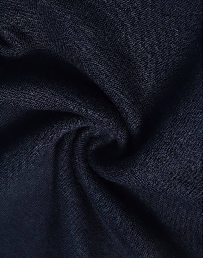A close-up of navy blue poly/cotton terry fabric, showcasing its soft and stretchy texture. Features a logo.