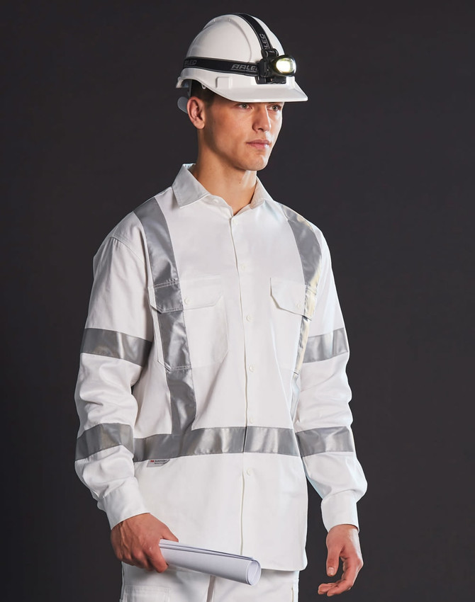 A white safety shirt with reflective stripes, worn by a model in a hard hat and headlamp, standing against a dark background.