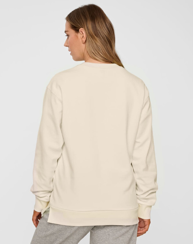 A unisex airlayered CVC crew neck sweater in a light beige colour, shown from the back. It features long sleeves and a relaxed fit.