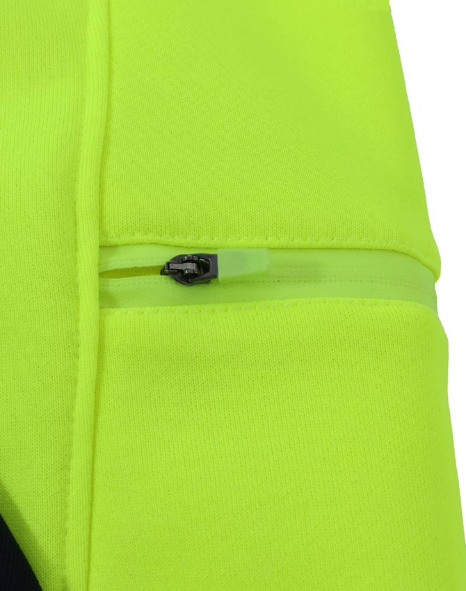 A close-up of a high-visibility two-tone water-resistant fleece hoodie, featuring a zippered pocket in vibrant yellow.