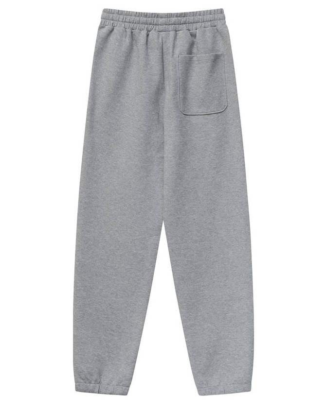 Unisex grey sweatpants with an elastic waist and a single side pocket, featuring a logo.