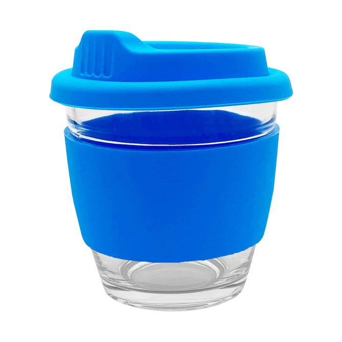 A reusable coffee cup with a glass body and a blue silicone sleeve and lid. It features a logo on the side.