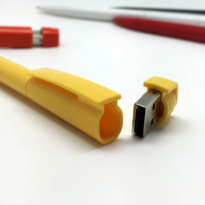 A yellow USB pen with a 16GB capacity, featuring a solid plastic design and a metallic USB connector.