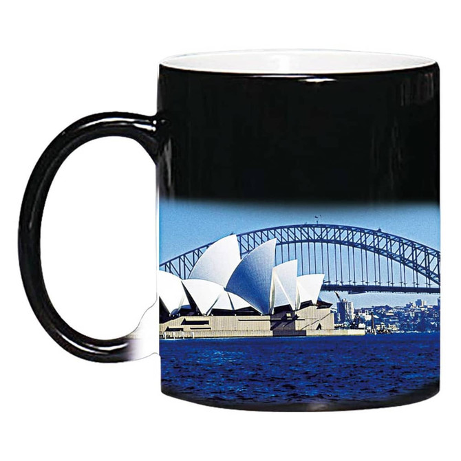 A coffee mug featuring a black exterior and an image of the Sydney Opera House and Harbour Bridge.