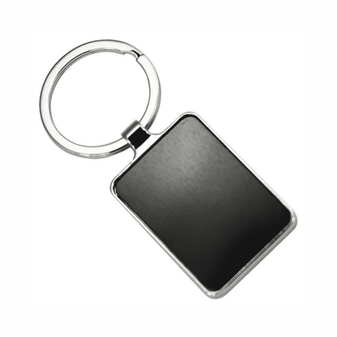 A keyring with a rectangular black tag and a shiny metal ring, featuring a smooth surface.