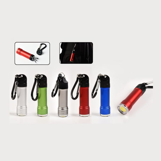 A collection of small torches in red, green, silver, and blue, each with a carabiner attached.