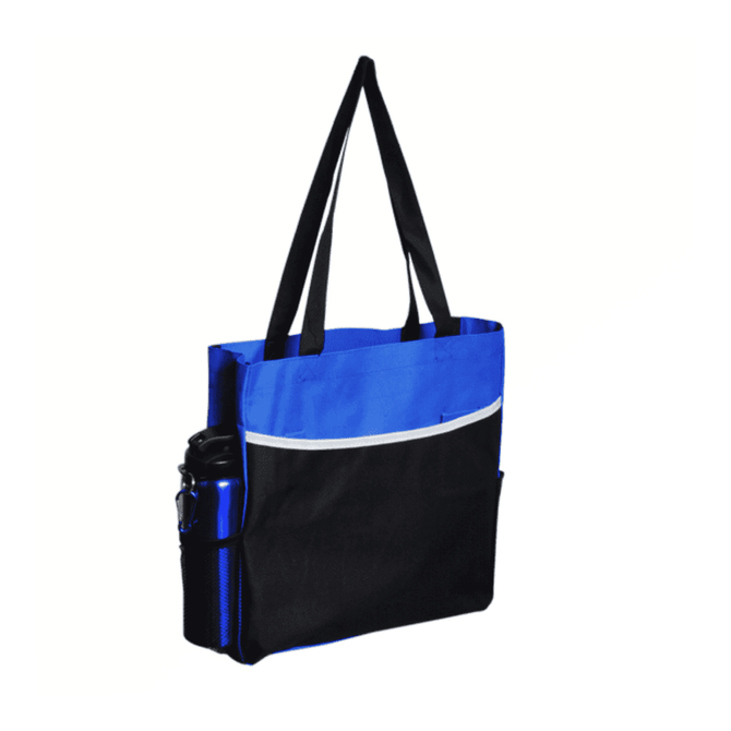 A drink bottle is tucked into a blue and black tote bag with two black straps and a front pocket.