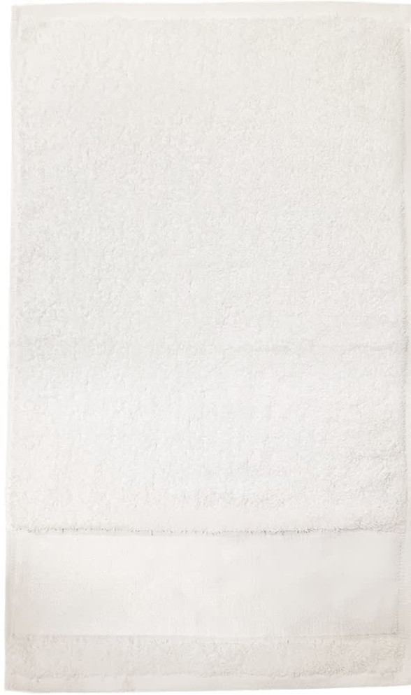 A white bath towel with a textured surface and a smooth border at the bottom. Features a logo in the corner.