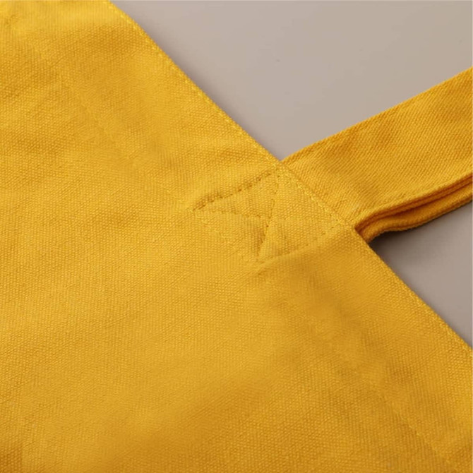 A drink bottle in a vibrant yellow colour, featuring a textured fabric surface and an integrated handle.