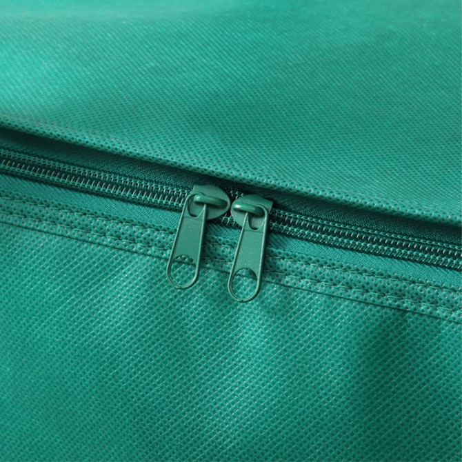 A green storage pouch featuring two metal zippers at the top, made from textured fabric.