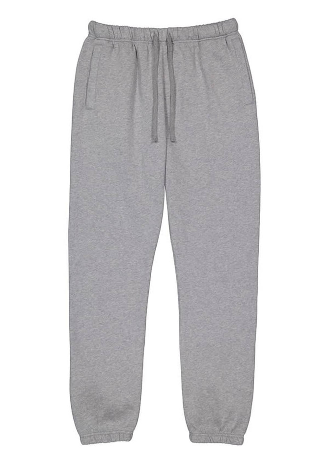 Grey track pants with an elastic waistband, drawstring, and side pockets. Features a brand logo on the waistband.
