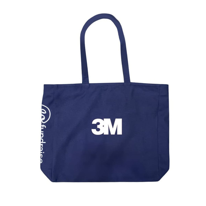 A navy blue tote bag with two handles and a logo visible on the side.