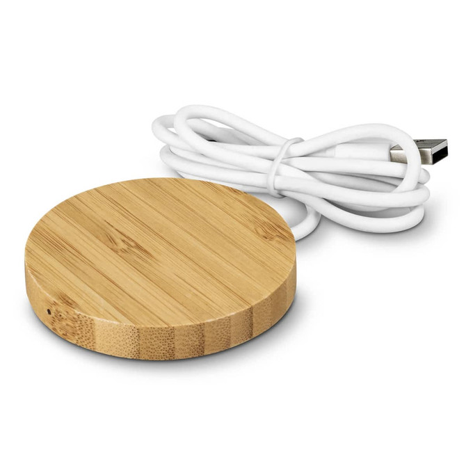 A round bamboo wireless charger with a white USB cable. The charger features a smooth, natural wood finish.