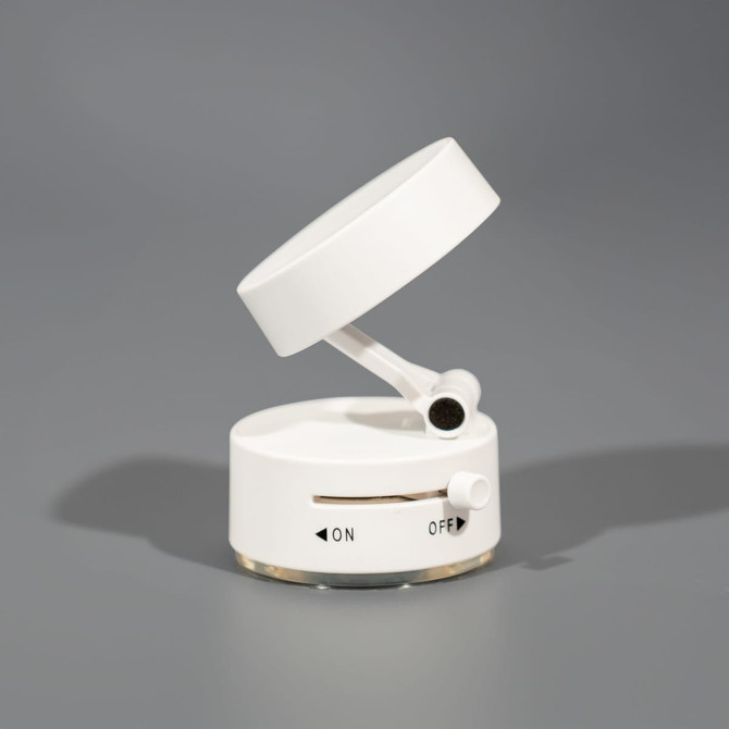 A white recycled ABS vacuum suction magnetic phone stand with an adjuster and an on/off switch.