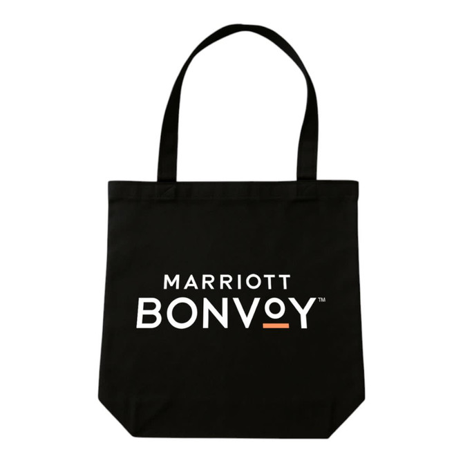 A black tote bag with two handles and a logo featured prominently on the front.