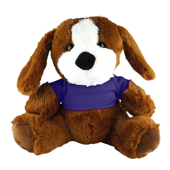A plush toy dog in brown with floppy ears, wearing a purple shirt and a friendly expression. It has a branded label.