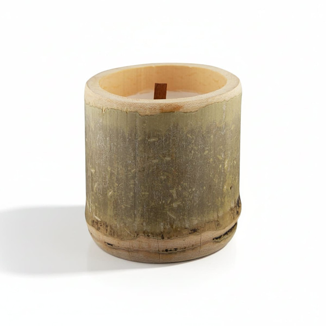 A bamboo candle in a cylindrical holder with a wooden wick, featuring natural green and brown tones.
