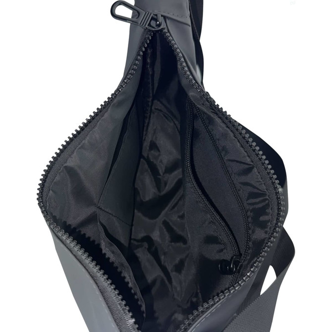 An open black satchel bag with a smooth interior lining and a zippered pocket. It features a zippered closure and has a logo.