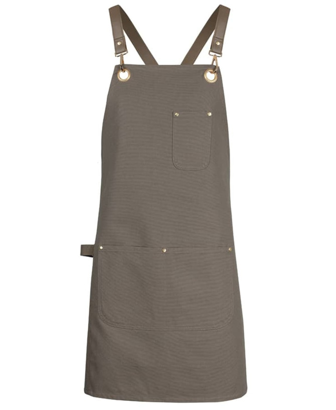 A khaki canvas apron featuring brass eyelets and adjustable PU straps, complete with a front pocket and a brand logo.