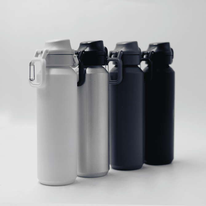 A drink bottle in white, silver, dark grey, and black, featuring a carrying handle and a logo.