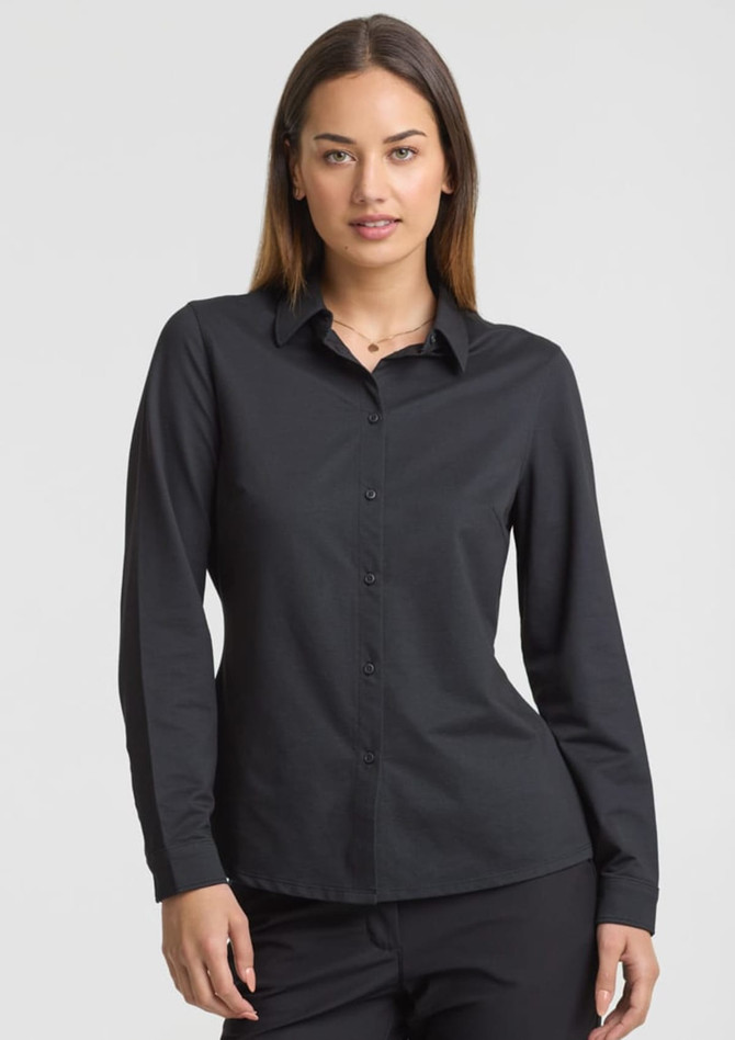 A women's long sleeve shirt in black with a collared neckline and button-up front, featuring a fitted design.