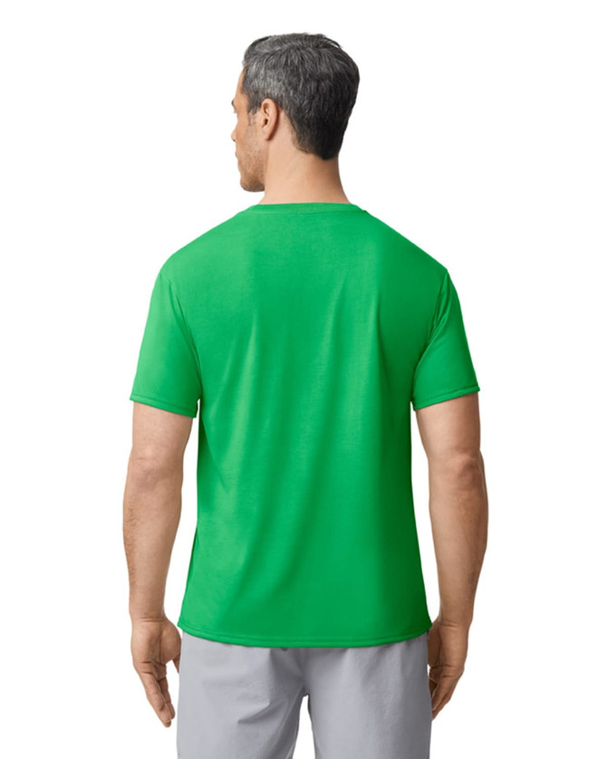 A green Gildan Performance adult t-shirt is displayed, showing the back view on a model. The shirt has a logo.