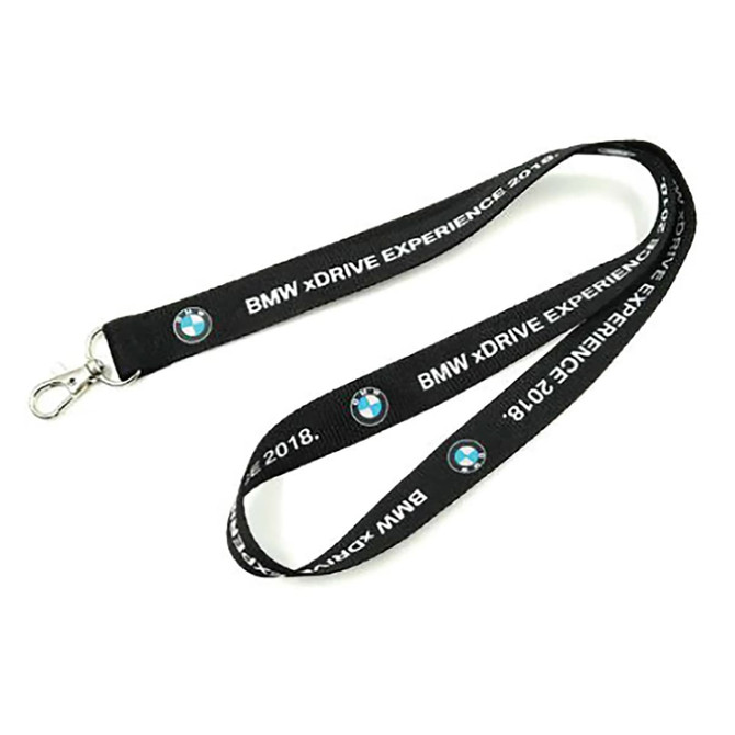 A black polyester lanyard with a clasp and printed branding. It features a sturdy design suitable for events.