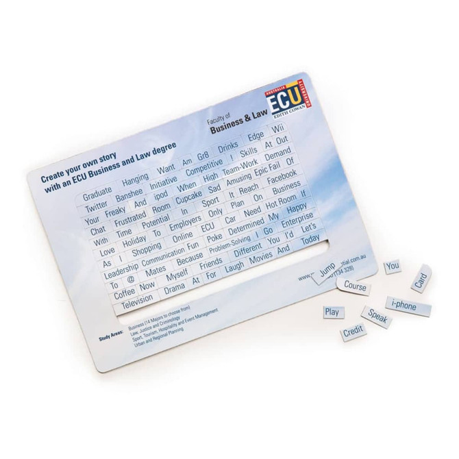 A set of white magnetic word tiles on a blue background, featuring various words for creative expression.