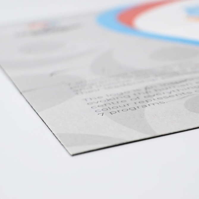 A magnetic jigsaw puzzle, featuring a colourful design with blue, red, and grey elements, showcasing a logo.