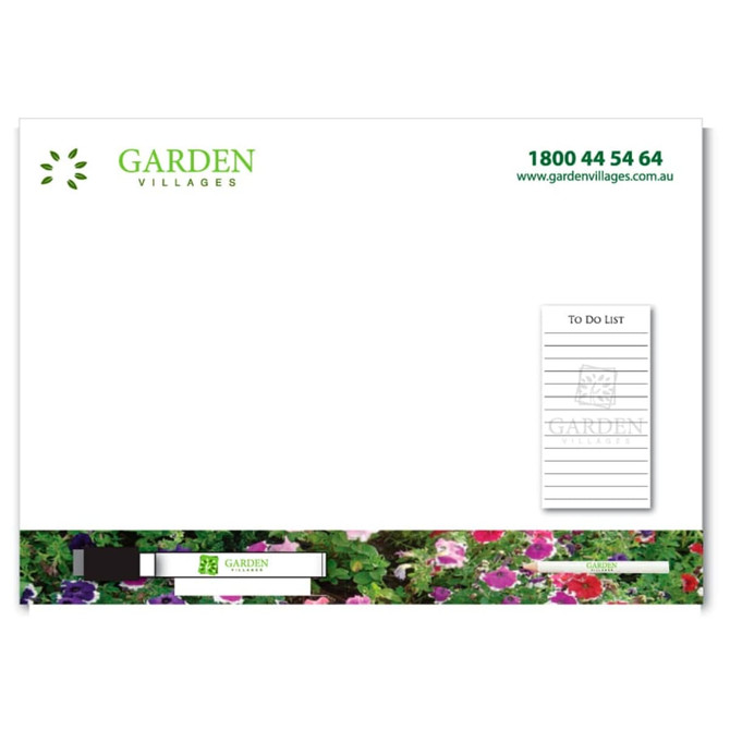 A3 magnetic whiteboard featuring a notepad section, with a floral design along the bottom and a logo.