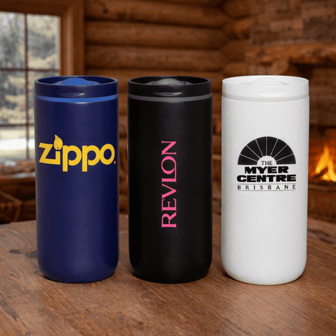 A drink bottle trio featuring a navy blue, black, and white vacuum tumbler with various logos.