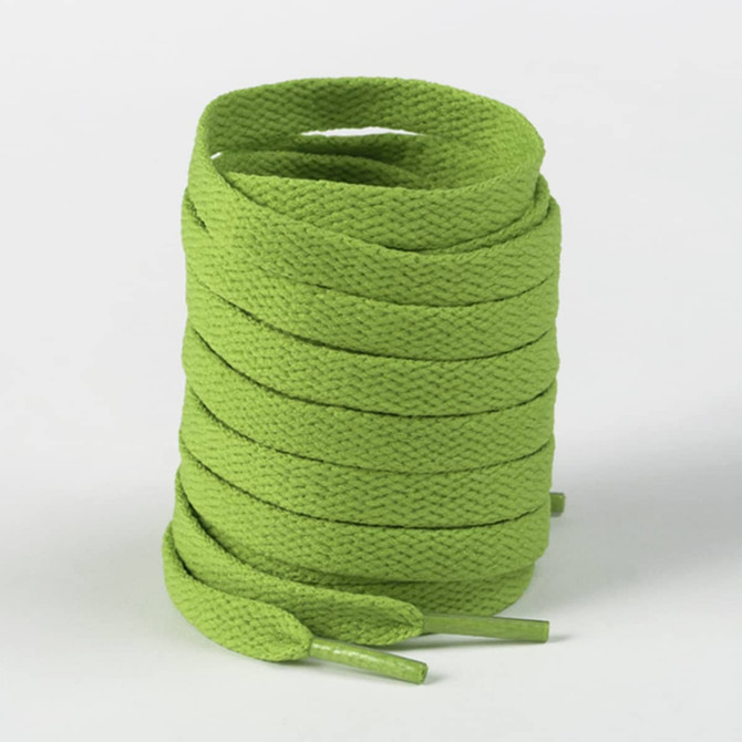 A stack of bright green shoelaces, tightly coiled, with pointed ends for easy threading.
