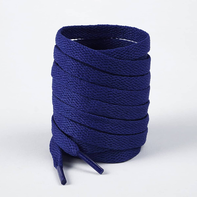A set of blue woven shoe laces coiled together, featuring two aglets at the ends.