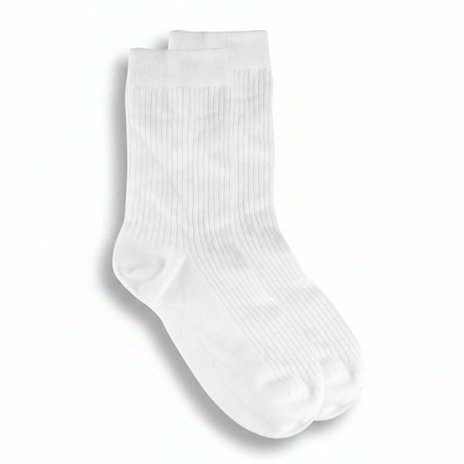 A pair of white lounge socks with a ribbed texture and rounded toes. The socks feature a branding logo.