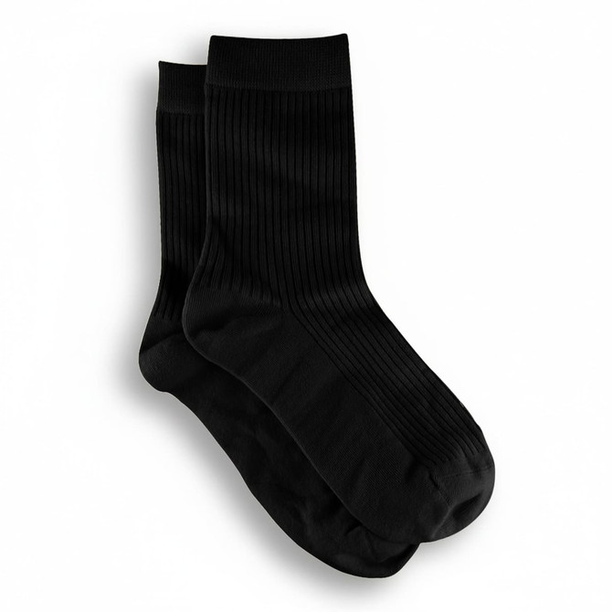 A pair of black ribbed lounge socks with a comfortable fit, featuring a simple design. They have a brand logo.